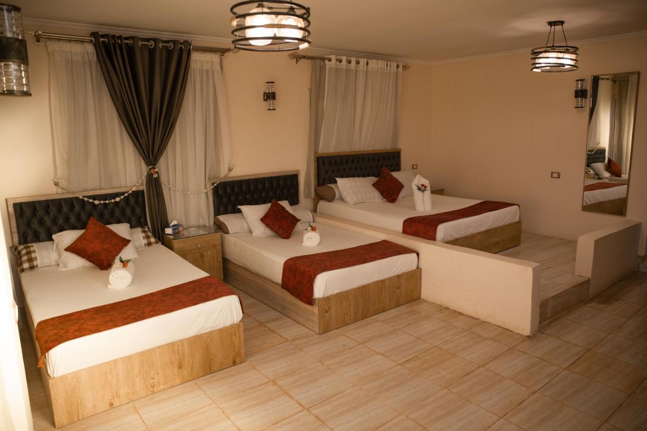 Heru Pyramids View Hotel Кайро Екстериор снимка